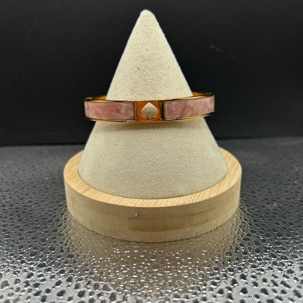 Kate Spade Gold and Pink Bracelet with Chic Design